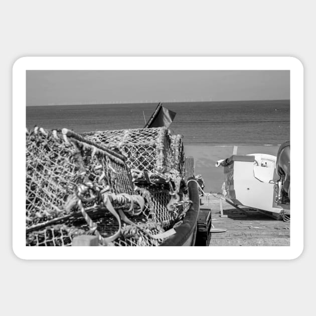 Lobster and crab pots on a fishing boat on the Norfolk coast Sticker by yackers1